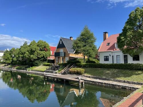 Canal-View 2LDK Wooden House with Atrium & Fireplace near Huis Ten Bosch in Nagasaki